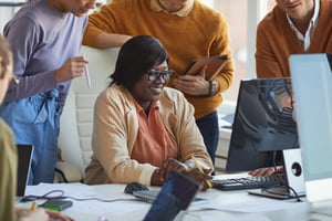 female-it-developer-enjoying-work-with-team-2025-03-08-20-26-03-utc